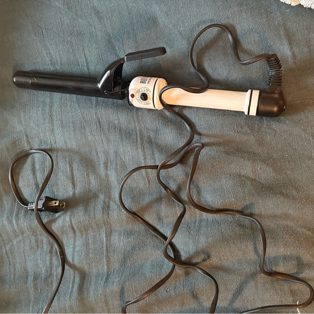 .75 in. Hot tools curling iron. Never used!